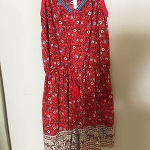 red romper with pattern worn once